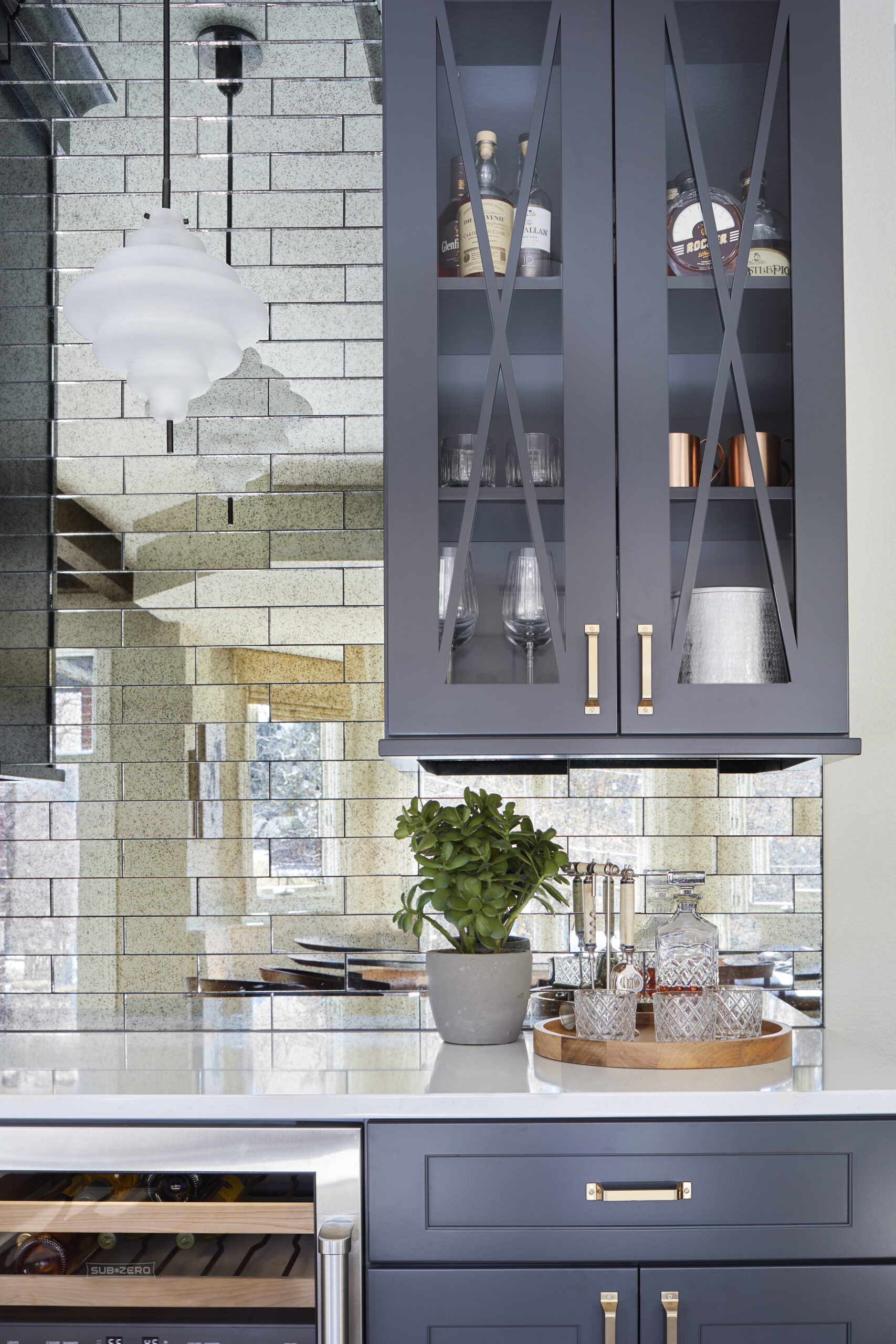 dry bar storage with upper and lower cabinetry